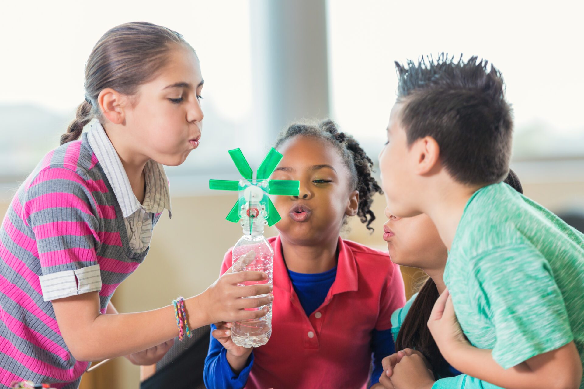 Elementary students studying alternative wind energy in science class